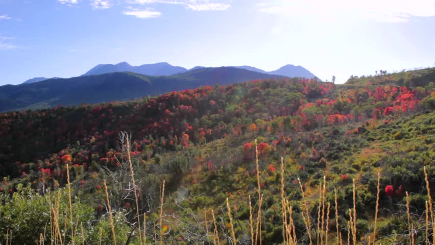A scenic mountain range during the fall colors. (Dolly Shot)