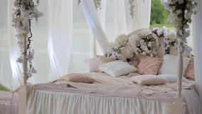 Beautifully decorated wedding bed.