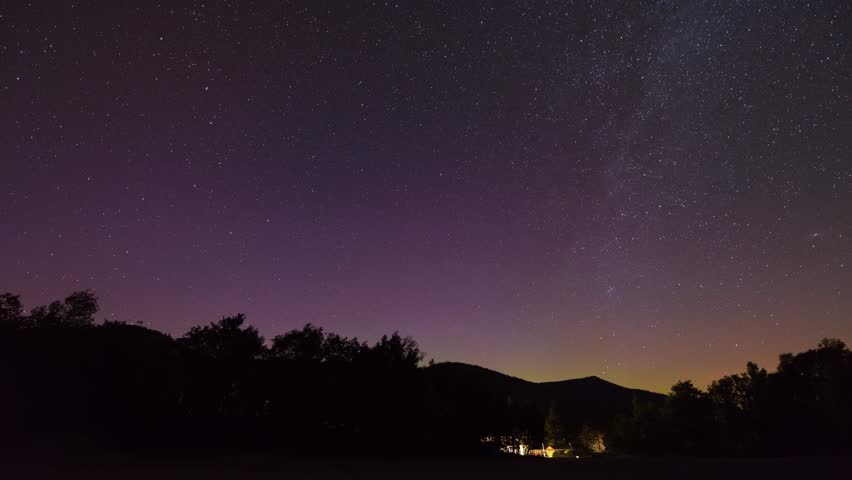 Star trails at the Adirondack Mountains in New York during an Aurora light show. 