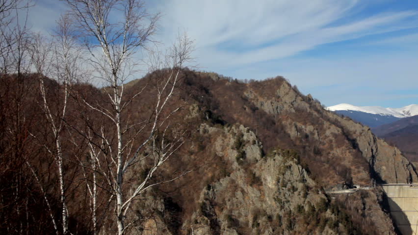 Panorama of Fagaras mountains and Vidraru dam lake from Romania in autumn