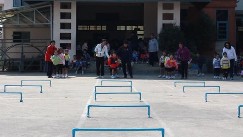 BANGKOK, THAILAND - JAN 26, 2016: Unknown children, run, kindergarten Students are studying Physical Education in Schools at kindergarten School. Pieamsuwan school in bangkok at 2016.