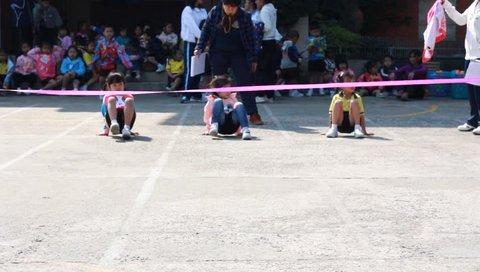 BANGKOK, THAILAND - JAN 26, 2016: Unknown children, crab walk, kindergarten Students are studying Physical Education in Schools at kindergarten School. Pieamsuwan school in bangkok at 2016.