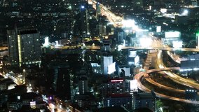 4K video time-lapse of modern urban city with freeway traffic night, Bangkok, Thailand