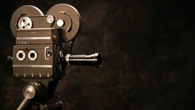 Vintage Hollywood Movie Camera in Front of Black Backdrop. Suitable for Film Title, Credits or Tv Show.