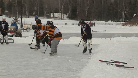 Minden, Ontario, Canada 2014 Pond hockey in Ontario Canada on freezing cold winter day
