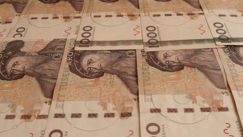 dolly shot of Swedish crones - one Thousand notes, Circulation of those notes is till the middle of 2016