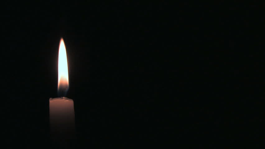 A lit candle off-center.