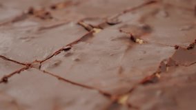 Crackled chocolate cake glazed confectionery surface slow panning 4K 2160p 30fps UltraHD video - Tasty looking chocolate glazed cake with shiny surface 4K 3840X2160 UHD footage