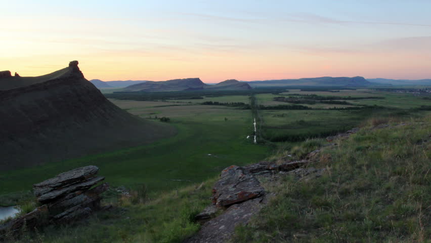 Sunset over the mountain ridge Sunduki. Republic of Khakassia, Russia, Full HD
