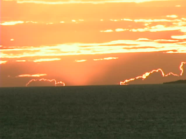 Maui sunset -- Sun below horizon, colorful sky
