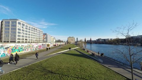 people at berlin wall, east side gallery time lapse -people walking