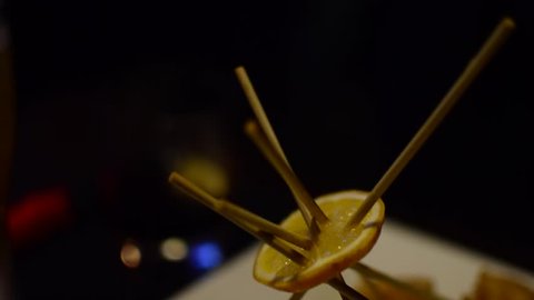 cheese dish on a stick with a lemon HD