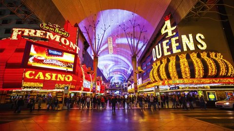 LAS VEGAS, NEVADA - FEBRUARY 5: Bright neon lights and tourists at the Fremont Street Experience in Las Vegas, Nevada on February 5th, 2016.
