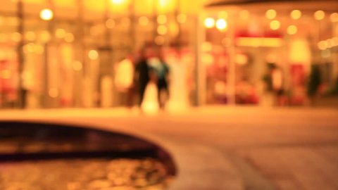 people in Shopping mall  defocused ,at night

