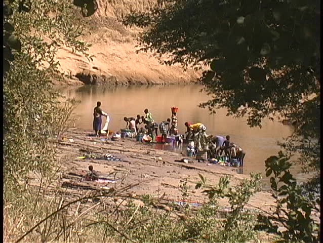 Women wash clothes in the Niger River in West Africa.