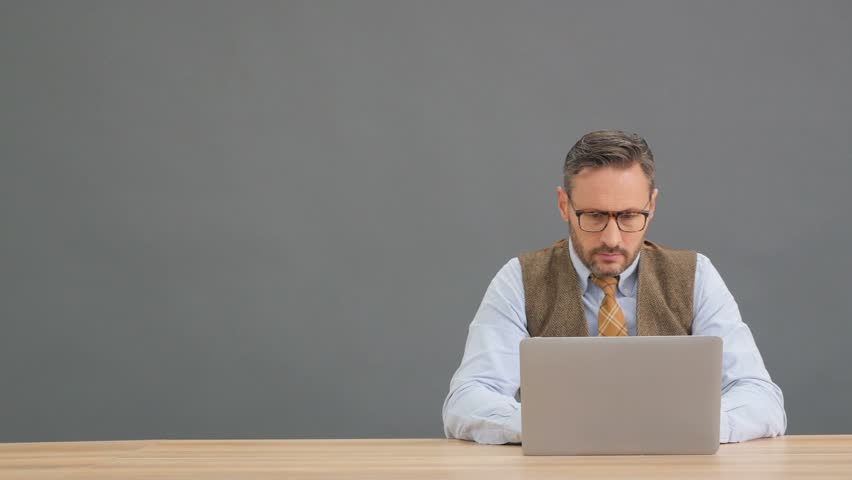 man sitting front laptop thoughtful expression Stock Footage Video (100% Royalty-free) 14450569 | Shutterstock