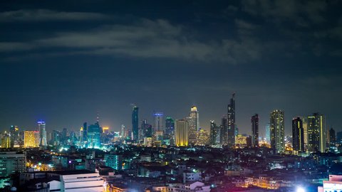 Night timelapse of Bangkok downtown with skyscrappers, Thailand