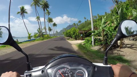 4K FIRST PERSON VIEW POV: Riding Vespa motor bike on sunny Bora Bora island resort