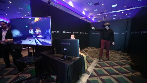 LOS ANGELES - JAN 23: VR enthusiast tries "Raw Data" at the Virtual Reality Los Angeles Winter Expo on Jan 23, 2016 in Los Angeles. The room scale android survival game is made by Survivors.
