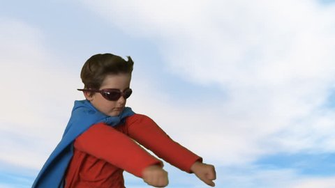 kid playing super hero