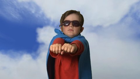 kid playing super hero