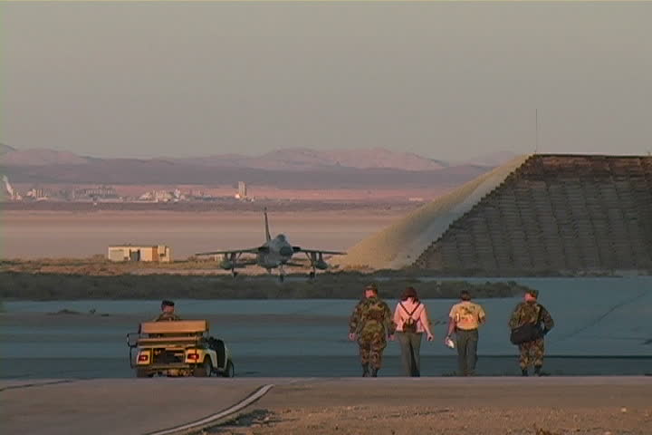 A pilot is denied access to a fighter jet on a military base