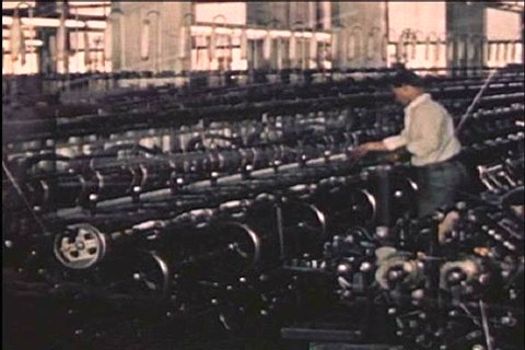CIRCA 1940s - Hosiery is made with higher control speed spindles in a textile factory in the 1940s.