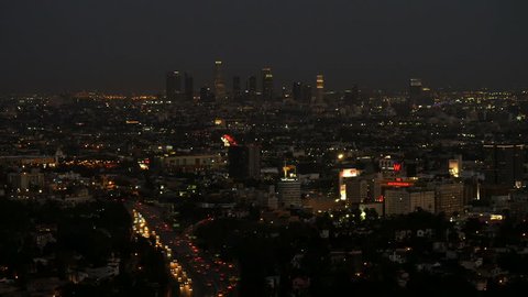 LOS ANGELES, CA, USA - APR 15.2015: Skyline of Los Angeles at night view from Hollywood Hills downtown and 101 freeway