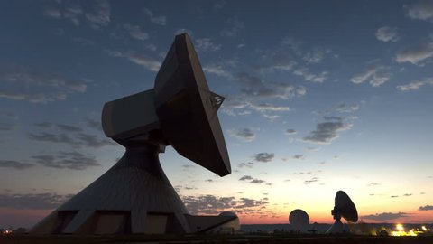 4K Time lapse zoom out Parabolic satellite dish sunrise at the earth radio station in Raisting