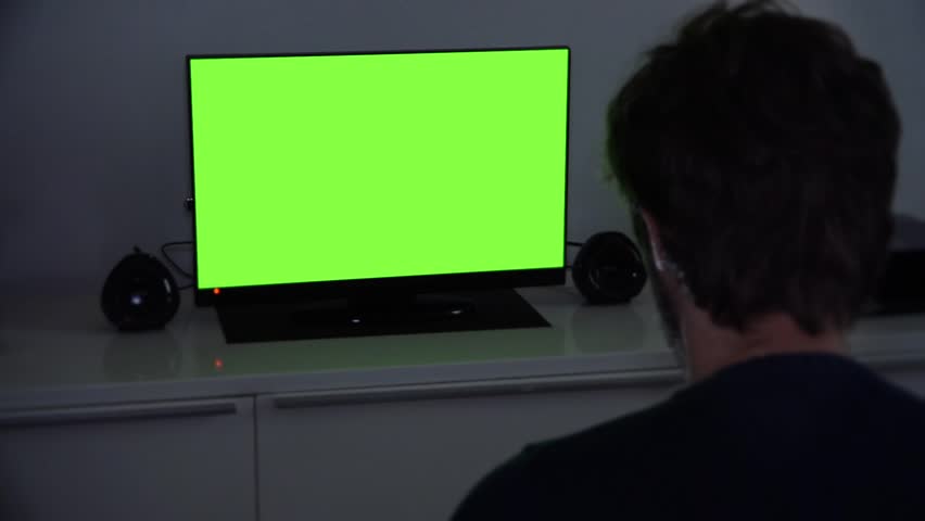 Man Watching Television Late at Night, Green Screen. Young man watching television green screen at night alone at home - 1080p | Shutterstock HD Video #14514295