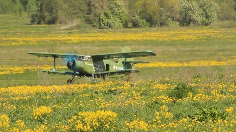 Ufa airport, - MAY 14: takeoff, the aircraft AN - 2 in MAY 14, 2014 in Ufa airport, Russia 