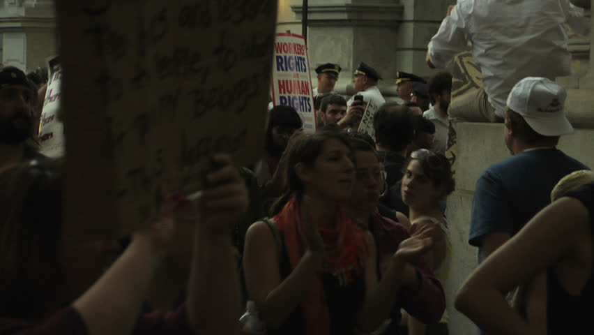 NEW YORK - SEPT 30: Protesters congregate outside One Police Plaza in Lower Manhattan on Day 14 of Occupy Wall Street September 30, 2011 in New York.