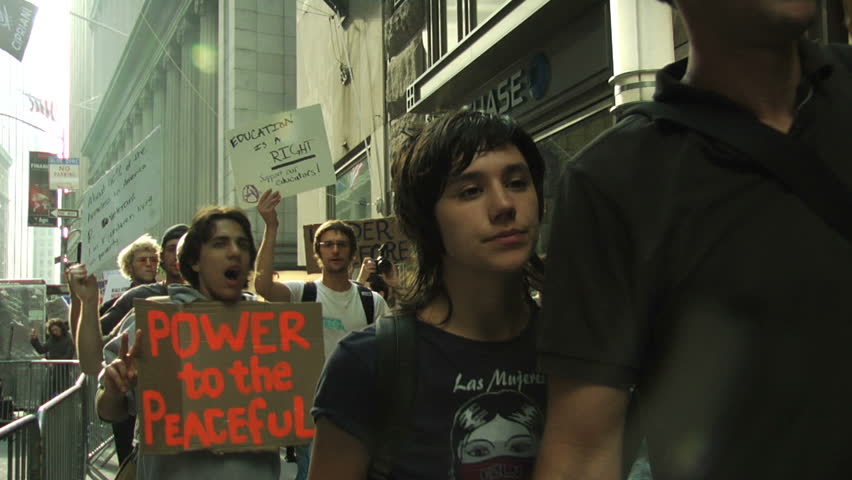 NEW YORK - SEPT 20: Protesters march to the NY Stock Exchange Building on Day 11 of Occupy Wall Street September 23, 2011 in New York. 
