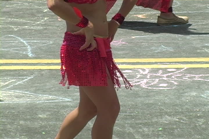 Brazilian dancers celebrate Mardi Gras in a parade.