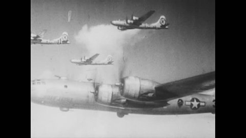 UNITED STATES 1940s: Aerial view of bombers / Plane drops bombs / Planes drop bombs / Bombs dropping / Plane drops bombs / Bombs dropping / Aerial views, explosions over Japan / View of parade.