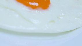 Egg yolk and white fried on oil for tasty breakfast 4K 2160p 30fps UltraHD food footage - Fresh hen eggs fried in frying pan with sunny side-up 4K 3840X2160 UHD video