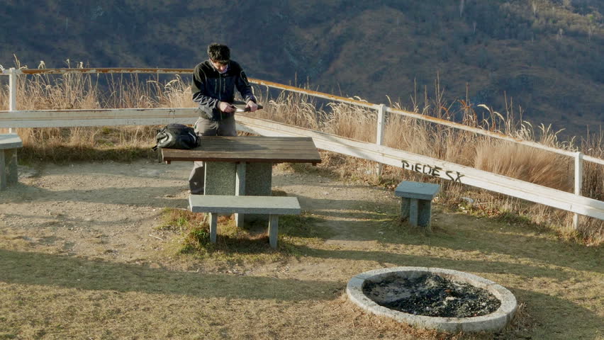 Boy draws the PC into a picnic area overview