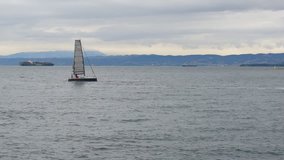 Sailing, preparing for the regatta, training sailors. Sailing yacht floats and does the reverse.