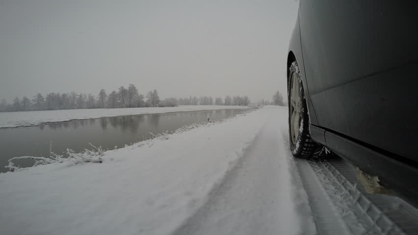 Driving in snow on a country road