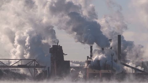 Ontario, Canada February 2016 Clouds of steam and smoke from heavy industry factory and plant

