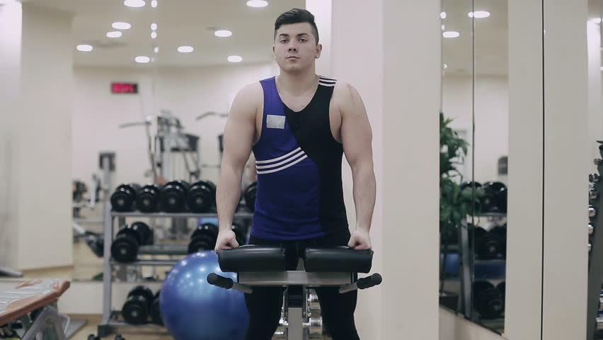 Weight loss: Man is exercising in gym
