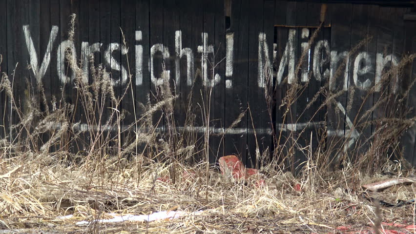 Warning about mines. Mined area. The war and devastation. The consequences of terrorism and military aggression.