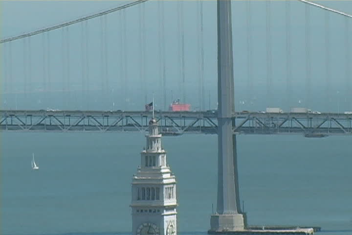 A zoom-out of the Bay Bridge and Downtown San Francisco.