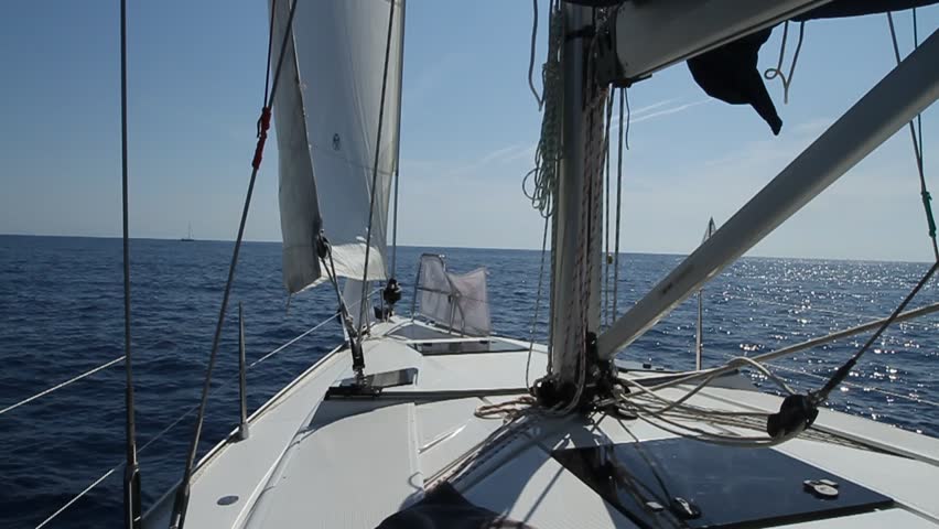 Sailing in the wind through the waves at the Mediteranean sea