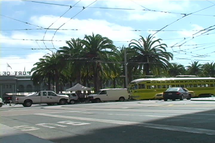 A streetcar making a turn in downtown San Francisco.