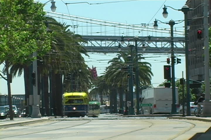 A streetcar unloading people in San Francisco.