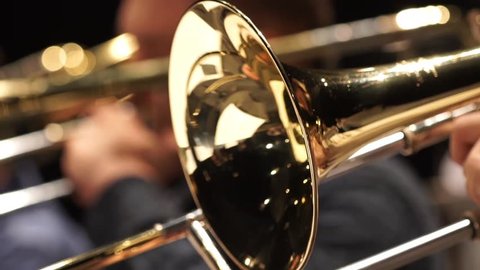 Jazzman playing trumpet close-up