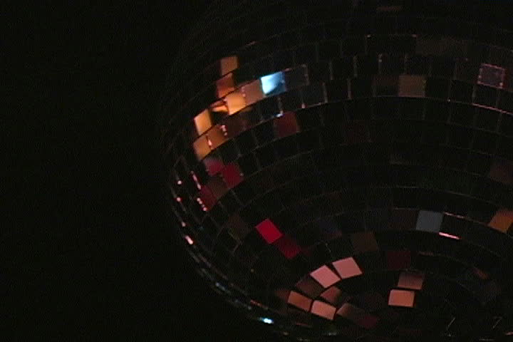A view of a disco ball spinning.