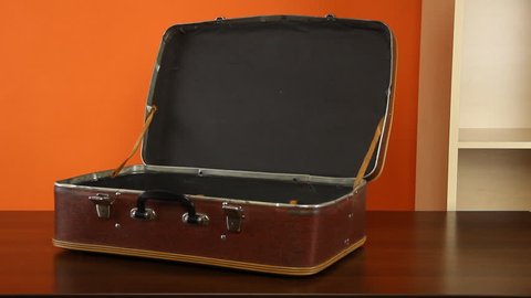 Packing Vintage Suitcase