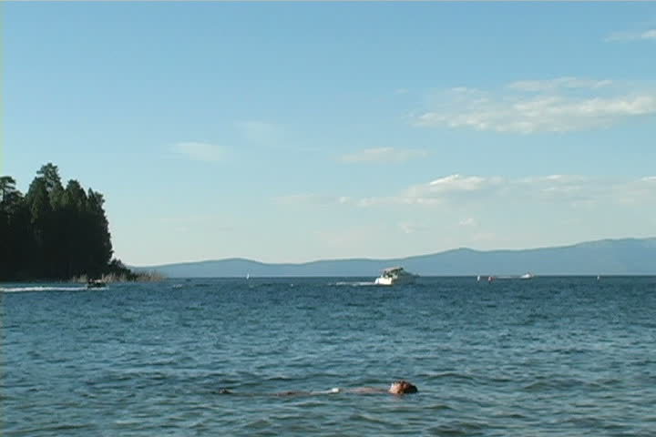 A man floating in Lake Tahoe.